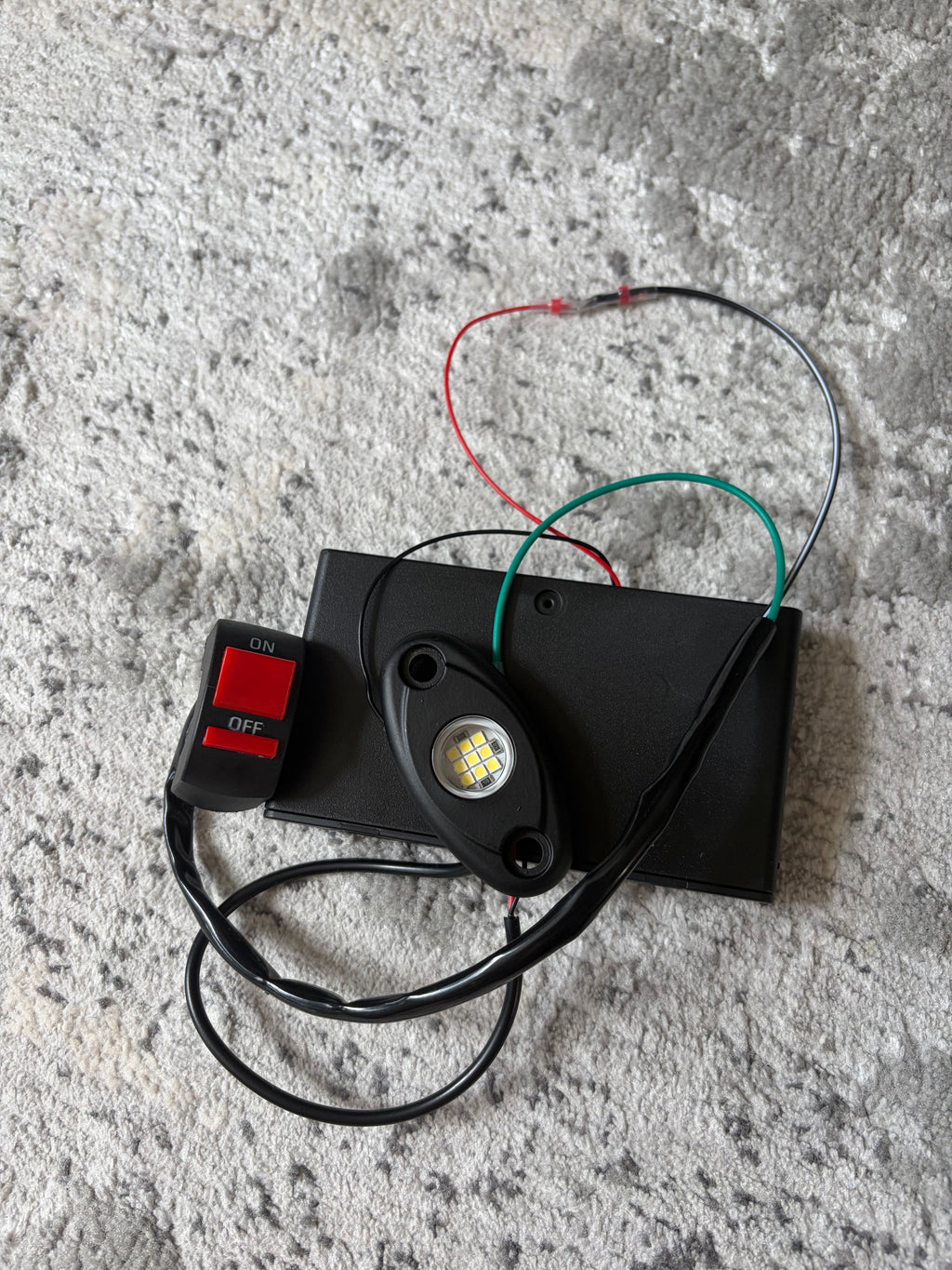 V1 rocklight (comes with battery pack and light switch for handlebars)