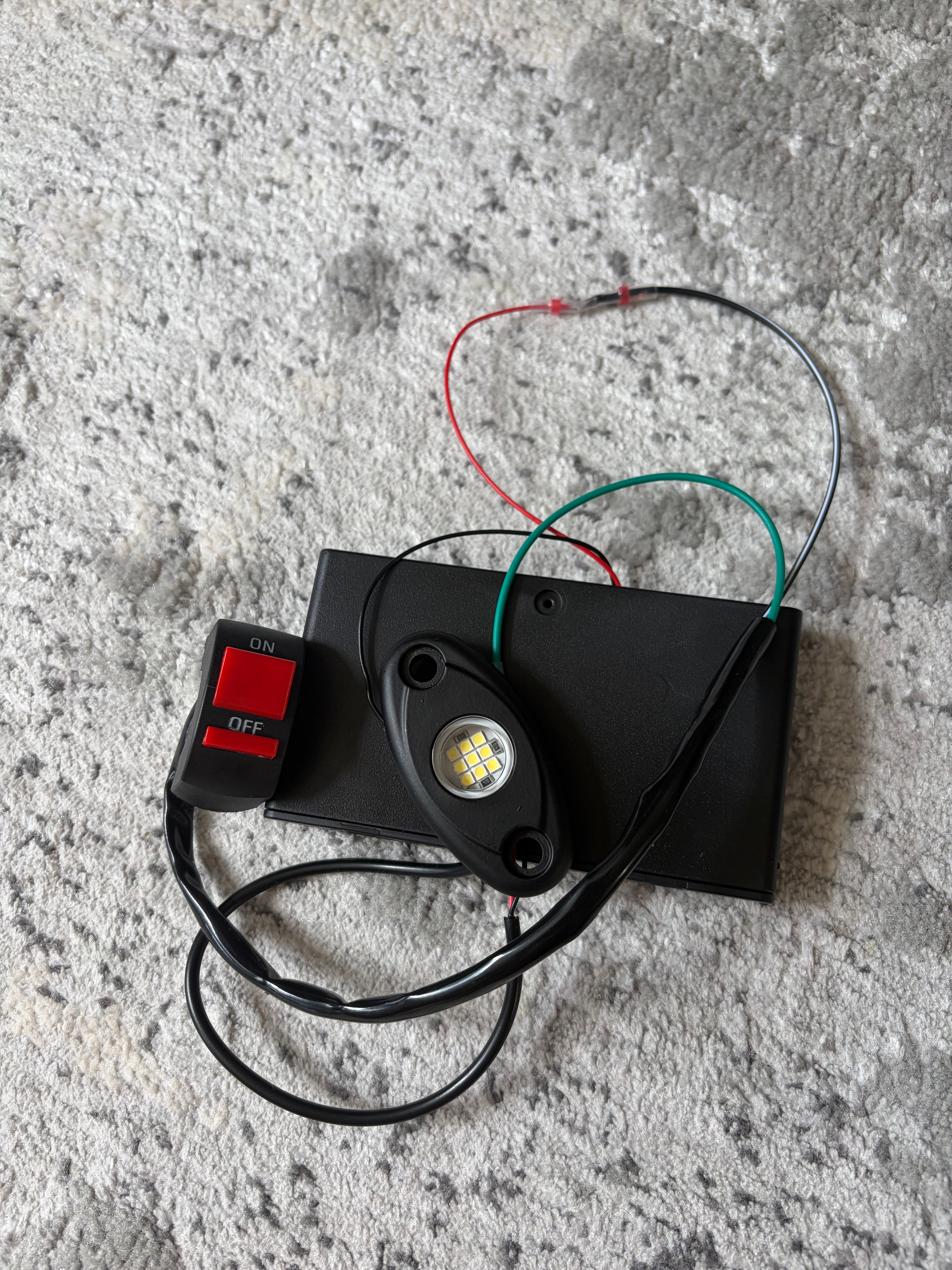 V1 rocklight (comes with battery pack and light switch for handlebars)